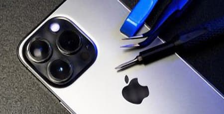 Phone repairing with a screw driver.